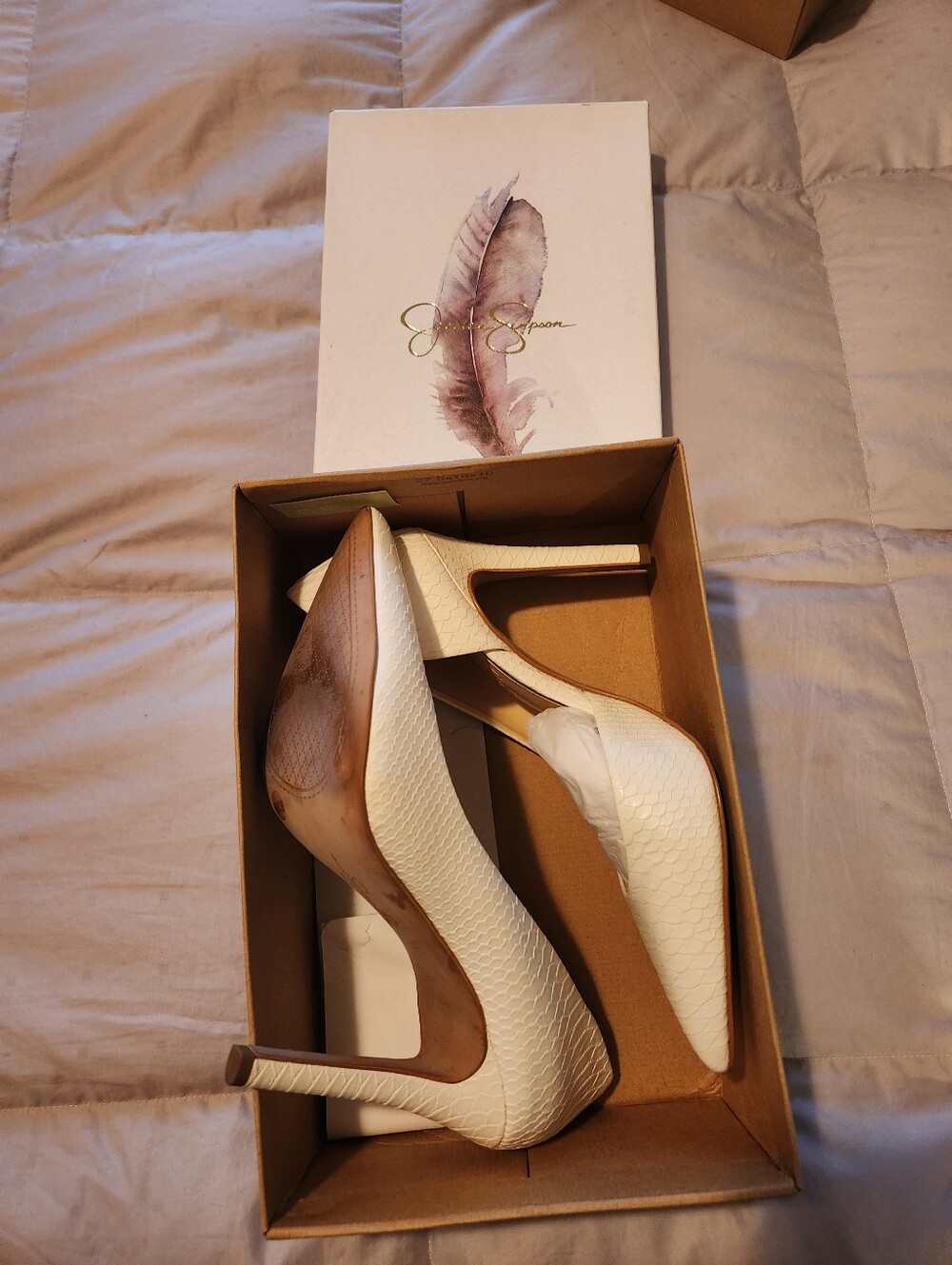 Jessica Simpson Ivory Textured Pointed-Toe Stiletto Pumps - Picture 2 of 2